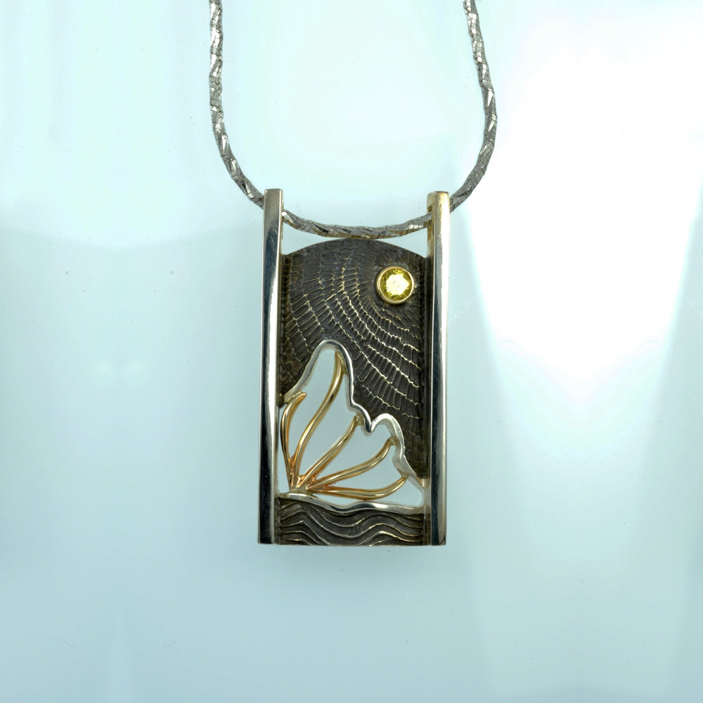 Butterfly under the Sun pendant.